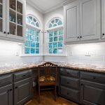 Cabinet Refinishing vs. Repainting: Which is Right for Your Kitchen?